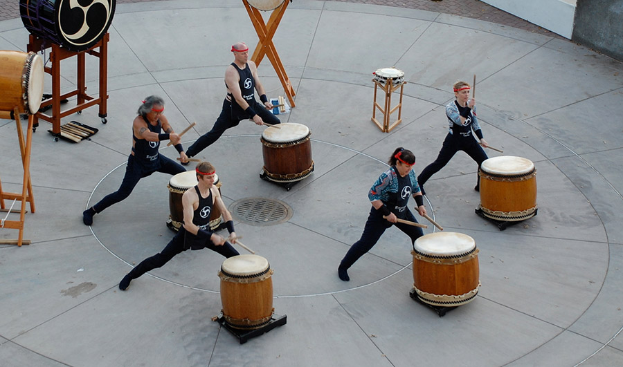 drummers performing in the outdoor square of lafayette