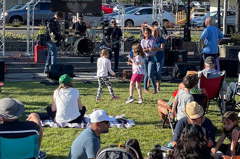 Kids dancing at concert at the park in Lafayette