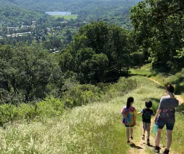 family hiking the hills of Lafayette